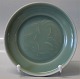 Royal Copenhagen Art Pottery
2705-1 RC Signed Jais Nielsen Celadon Glaze Tray with mythological being in 
relief 15.5 cm