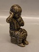 Royal Copenhagen Art Pottery 5395 Boy sitting 15 cm Signed JH for Johannes 
Hedegaard