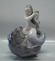 Royal Copenhagen figurine 
2337 RC Mermaid riding seal with fish Knud Kyhn 18 x 18 cm 1923