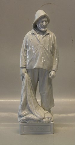 Royal Copenhagen blanc de chine figurine Sailor with fishingnet  12214 RC Skagen 
13.25" / 33.5 cm