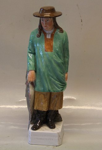 Royal Copenhagen Norwegian figurine fro the Nordmans valley of Fredensborg 
Castle 28 cm 
The Valley of the Norsemen
