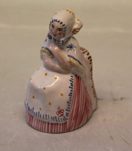 L.Hjorth miniature lady sitting in a chair in her national dress ca 10 cm