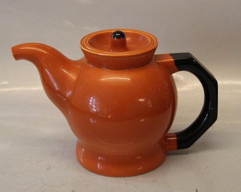 141 Tea pot, ochre 1 l (1191141-34700) 142 -143 Ursula Tableware  The original 
Royal Copenhagen Faience