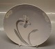 Royal Copenhagen 
81-10021 RC plate with flower design Arnold Krog with Marguirite ca 10 cm 
painter 85 pre 1923