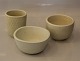 Royal Copenhagen Aluminia Faience 
Marselis Yellow / Creme vases and bowls