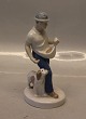 21912 "The Sower"  Farmer with dog19.5 cm German Porcelain Figurine Crossed 
Swords