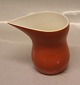 441 Ochre jug, small 31 cl. (1191441-8000) . 
 Ursula Dinnerware Royal Copenhagen Aluminia Faience