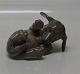 Royal Copenhagen figurine dog 1408 RC Lying Dachshund OM 6 x 12 cm