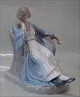 Royal Copenhagen figurine 0673 RC Thoughtful woman in Chair 1905 21 x 24 cm
