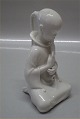 Royal Copenhagen figurine 
2342 RC Opium Smoker 14 cm Arno Malinovski Blanc de Chine